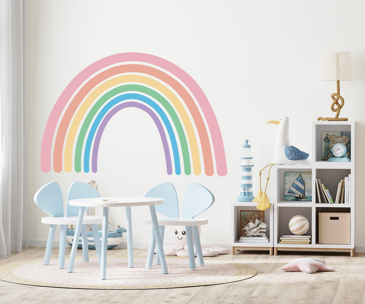Charming boho rainbow wall sticker in a nursery, adding color and whimsy to the decor.