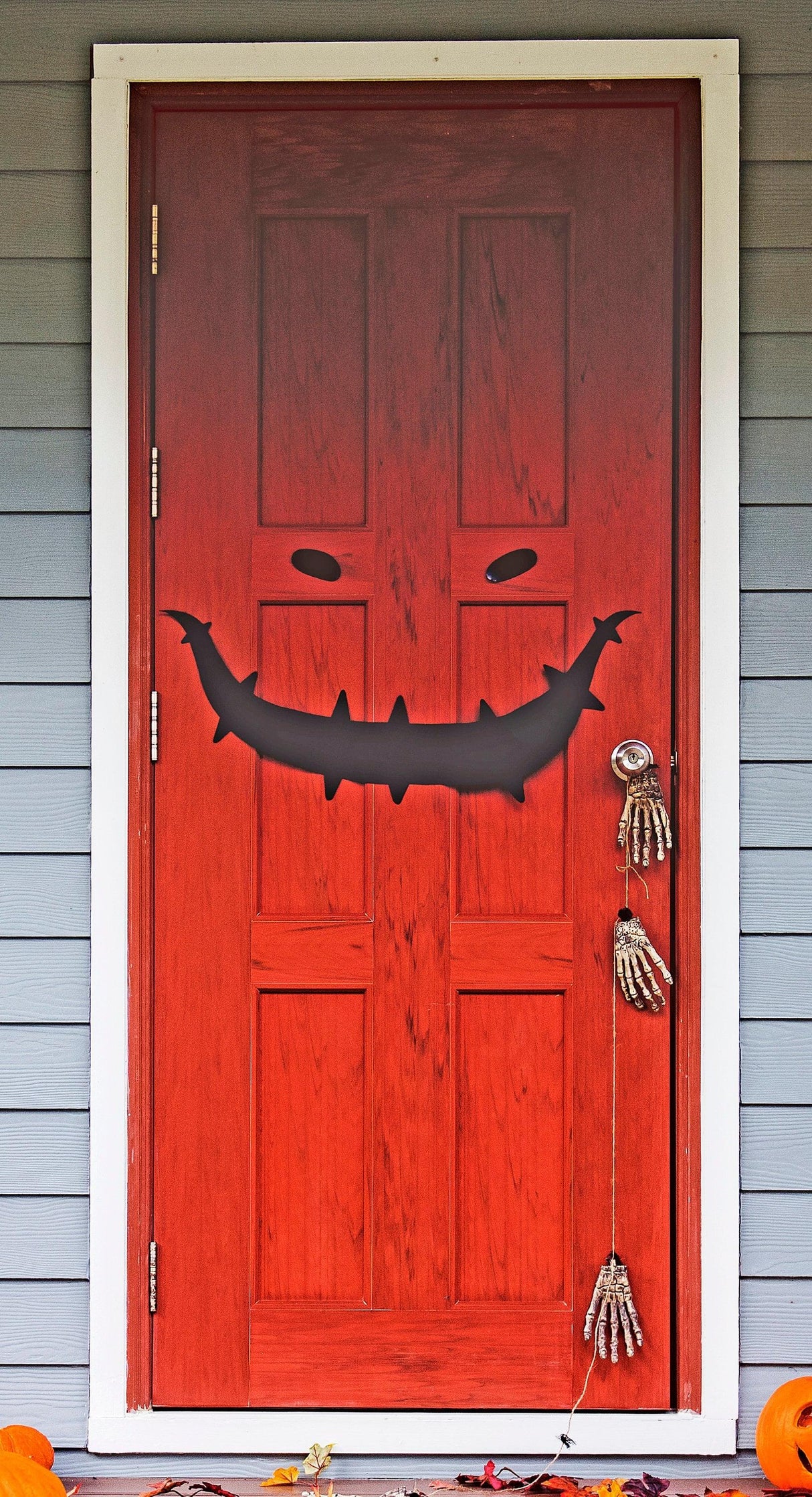Halloween Scarry Smile Door Decal featuring a spooky monster smile on a red door.