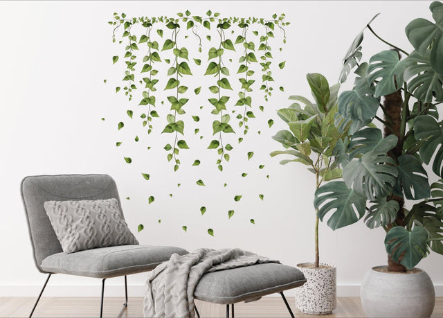 Hanging Vine Wall Sticker featuring green ivy leaves, ideal for enhancing living room decor.