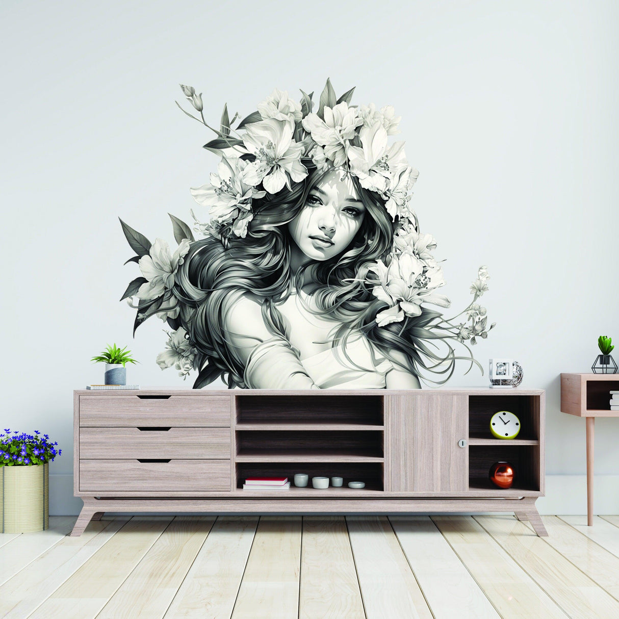 Stunning woman with floral hair wall decal in elegant black and white above a modern TV stand.