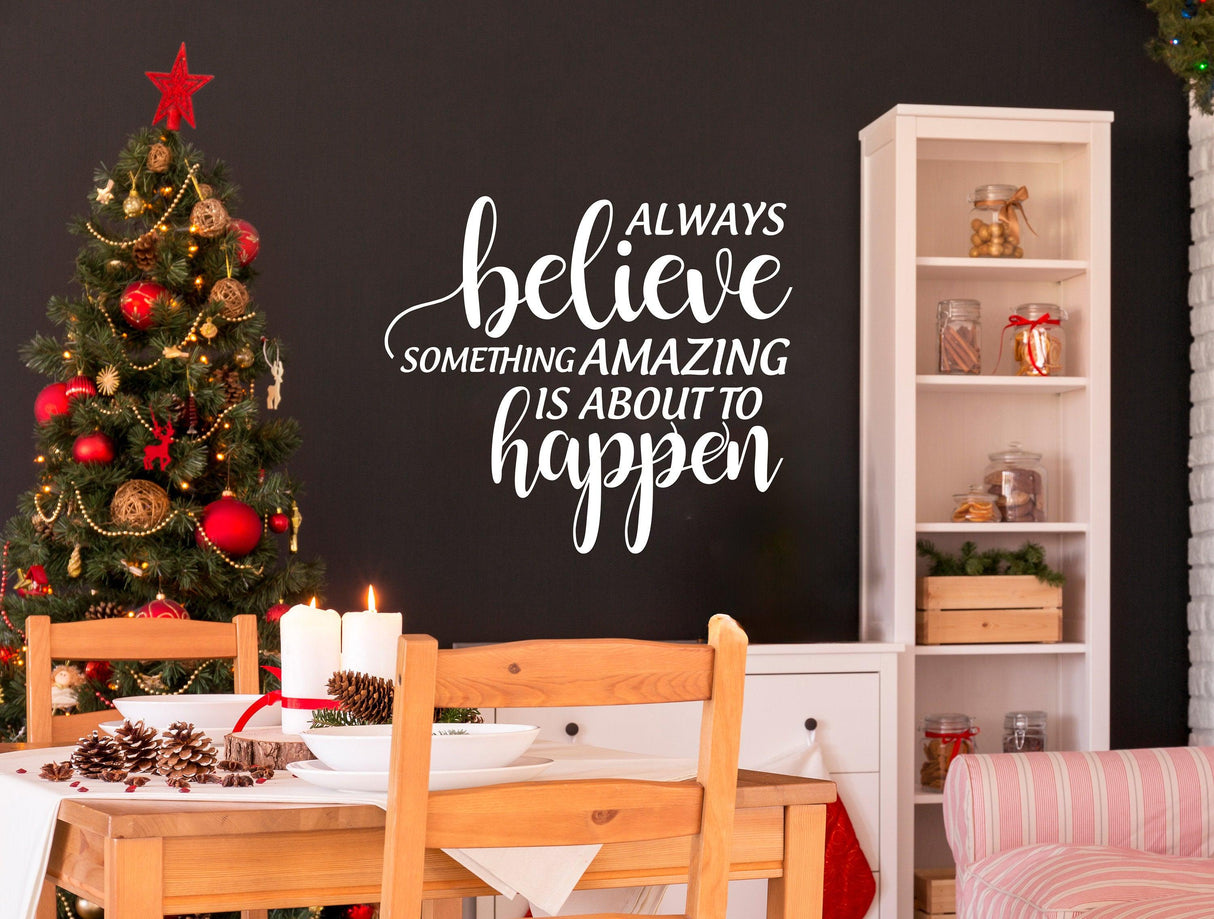 Inspiring Christmas quote vinyl sticker on wall, surrounded by holiday decor and a Christmas tree.