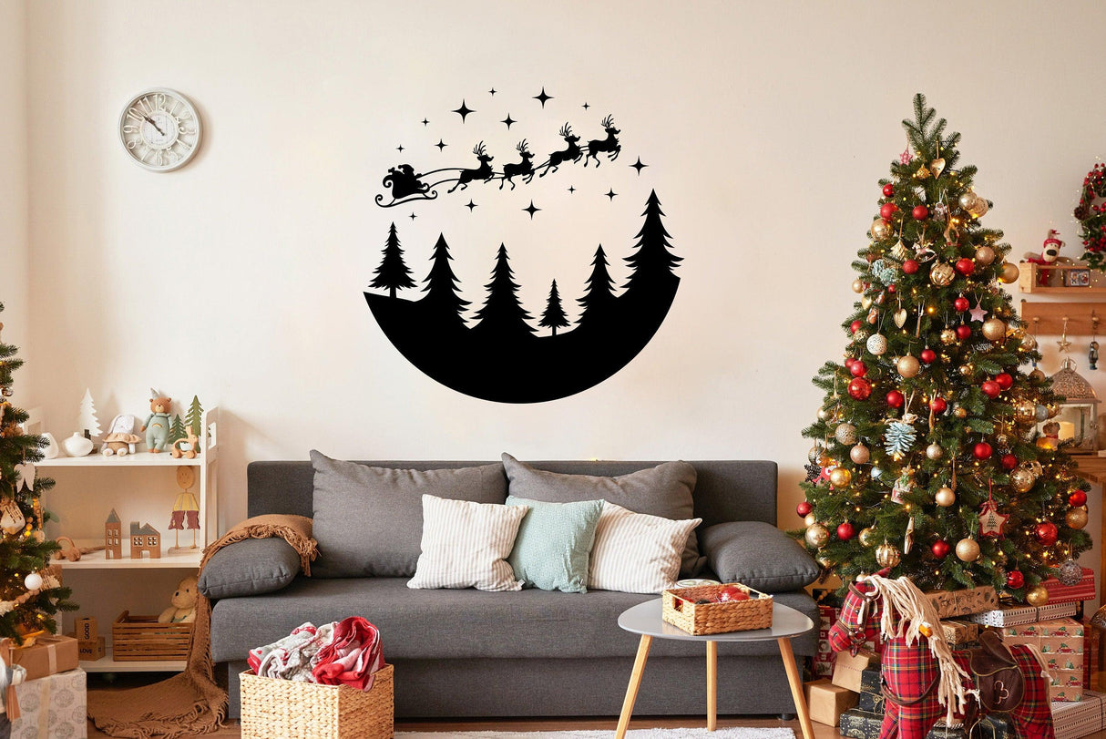 Circular Santa sleigh and reindeer wall decal in a festive living room with Christmas trees.