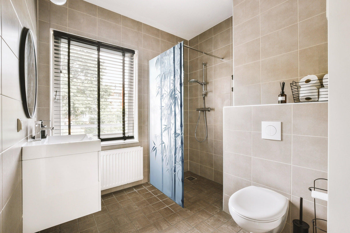 Stylish bathroom with Tranquil Bamboo Forest Shower Glass Door Sticker adding privacy and serene ambiance.