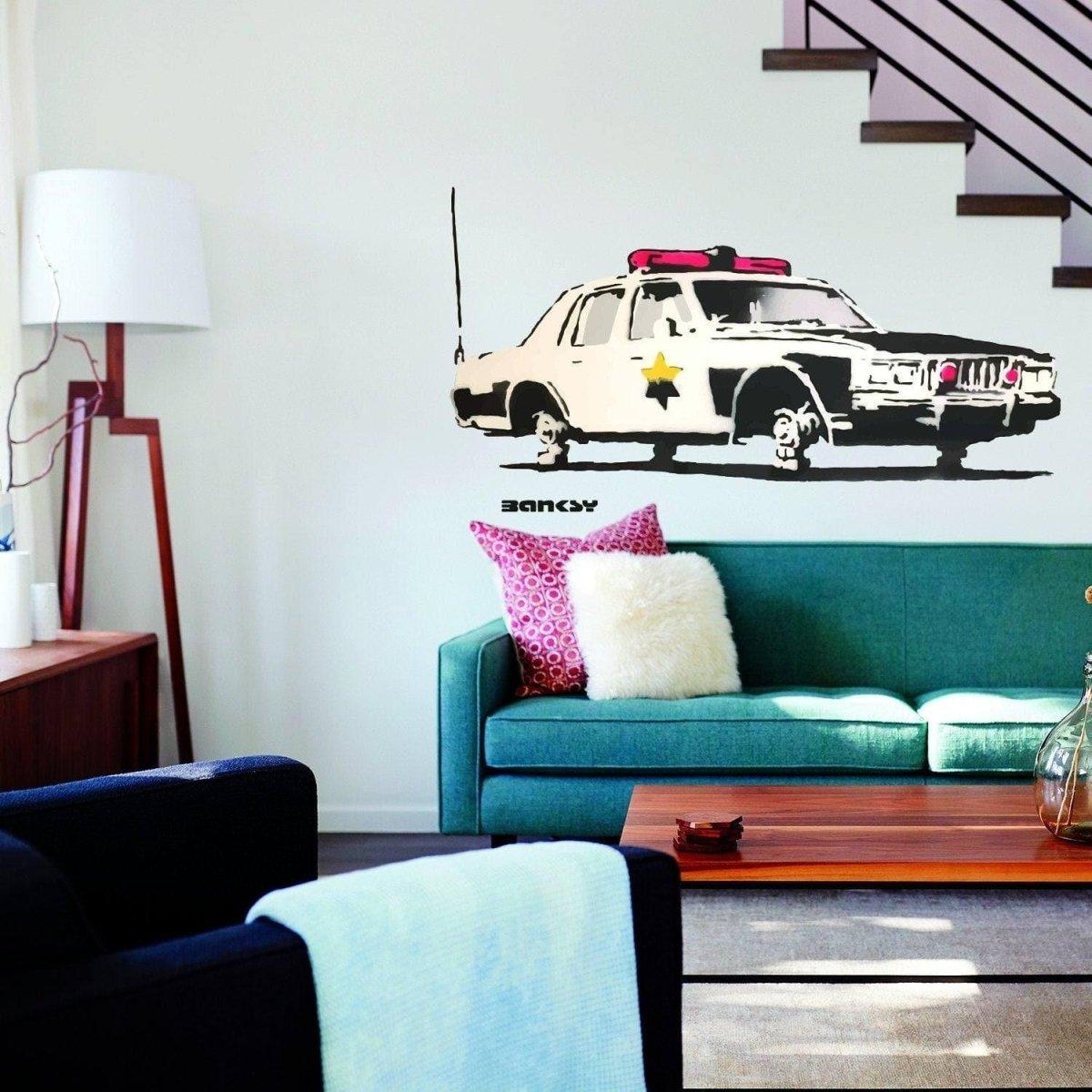 Police car wall sticker on living room wall, perfect wall decor for kids' rooms and playful spaces.