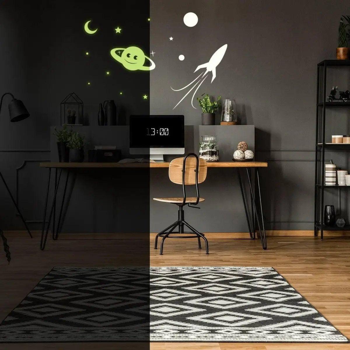 Glow in the dark star and planet wall stickers in a stylish workspace, showcasing cosmic decor on a dark wall.