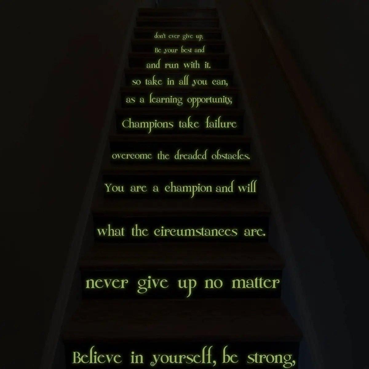 Glowing motivational quote vinyl sticker on stairs, inspiring messages encouraging perseverance and self-belief.