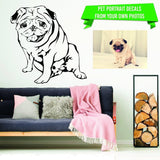 Custom pet portrait wall decal made from a dog photograph and displayed above a sofa in a living room.