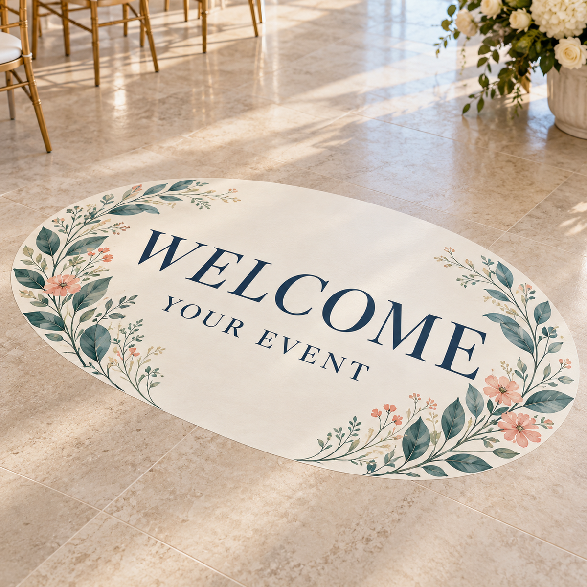 Example of an oval custom event floor decal with Welcome lettering and a floral design