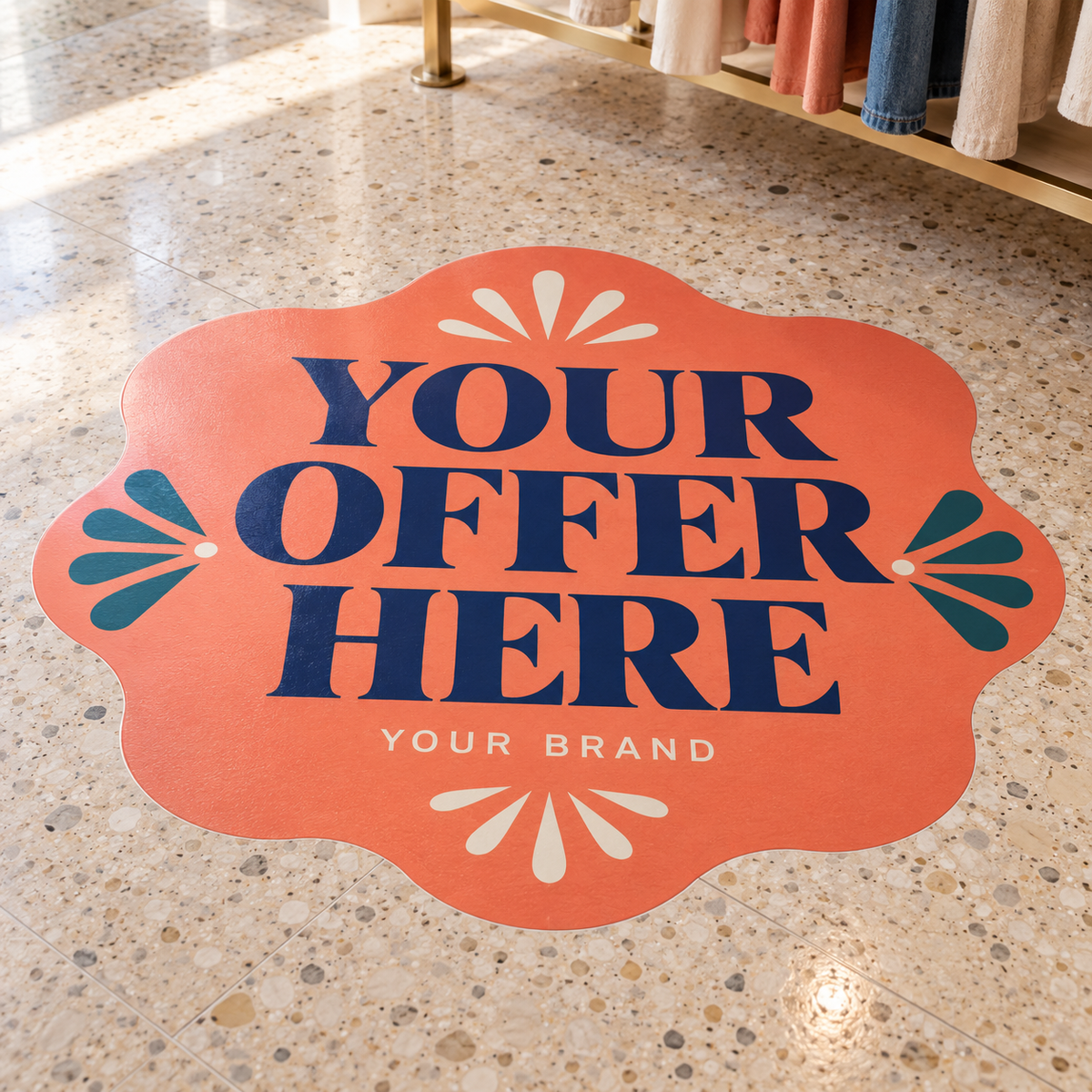 Example of a shaped promotional floor sticker with Your Offer Here artwork in a clothing store