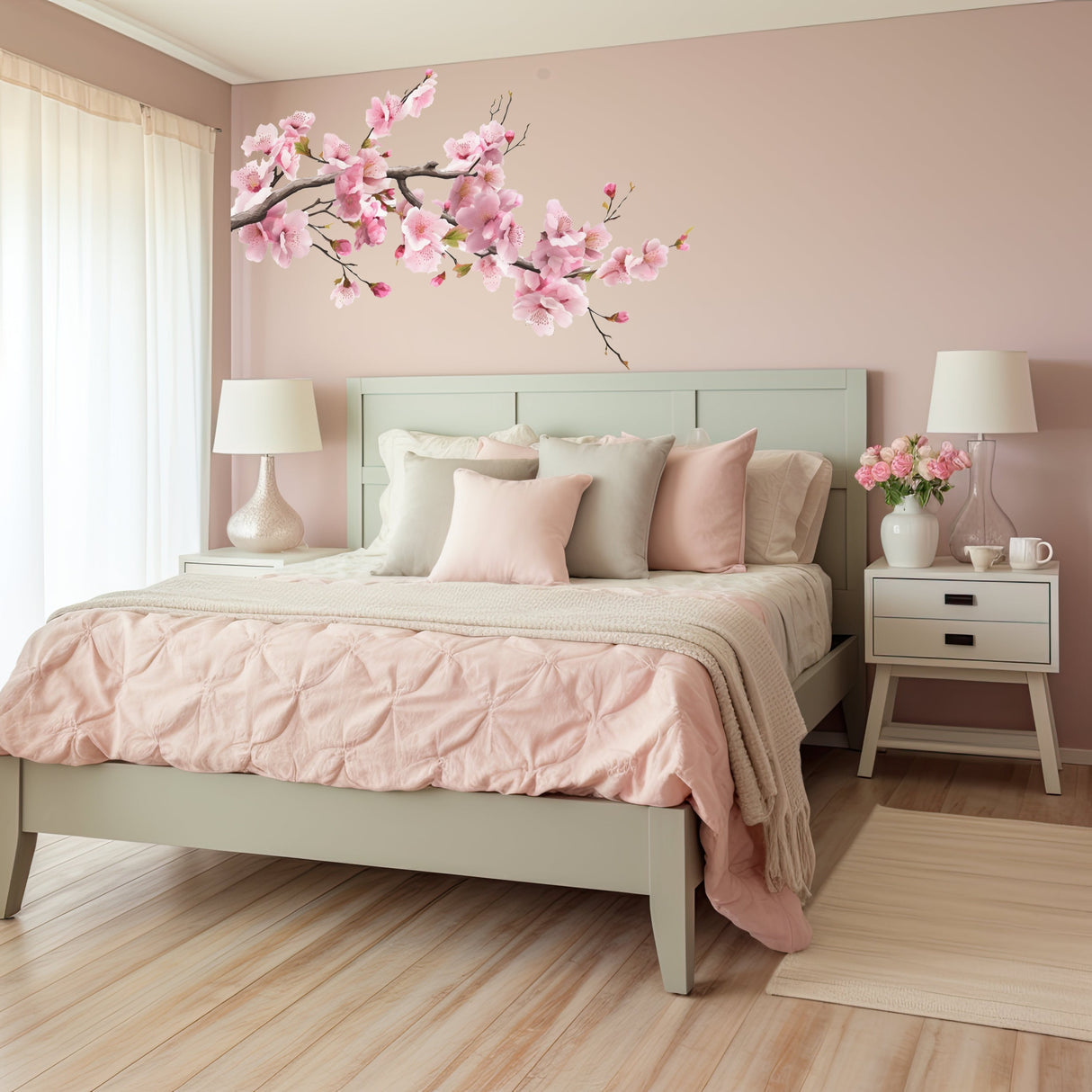 Pink cherry blossom branch wall decal shown in an alternate furnished interior view without promotional text.