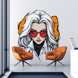 A bold anime-style wall decal of a confident woman with white hair, red sunglasses, and a serious expression, styled in comic book fashion with clean outlines and warm tones, placed above two modern orange chairs.