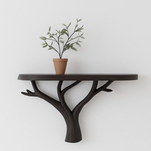 Black 3D printed wall shelf shaped like branching tree limbs, mounted on a white wall and holding a terracotta potted plant.