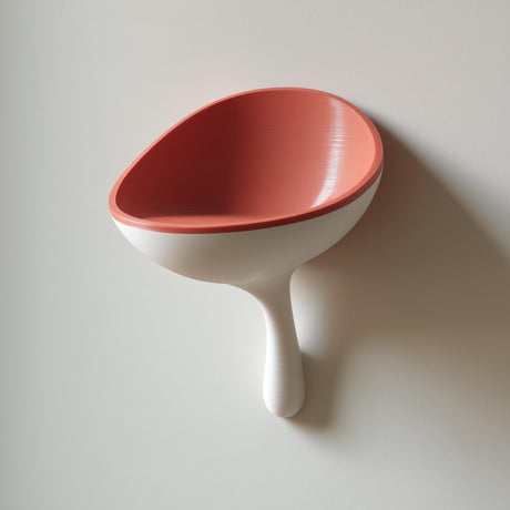 3D printed scoop-shaped wall shelf with a rounded stem support, used as a modern catchall bowl for small items on a light-colored wall.