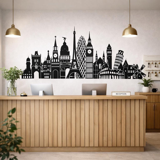 A horizontal black silhouette illustration of various European landmarks on a white background. It includes the Eiffel Tower, Big Ben, the Colosseum, the Leaning Tower of Pisa, the Kremlin, and a Dutch windmill, all arranged in a continuous skyline.