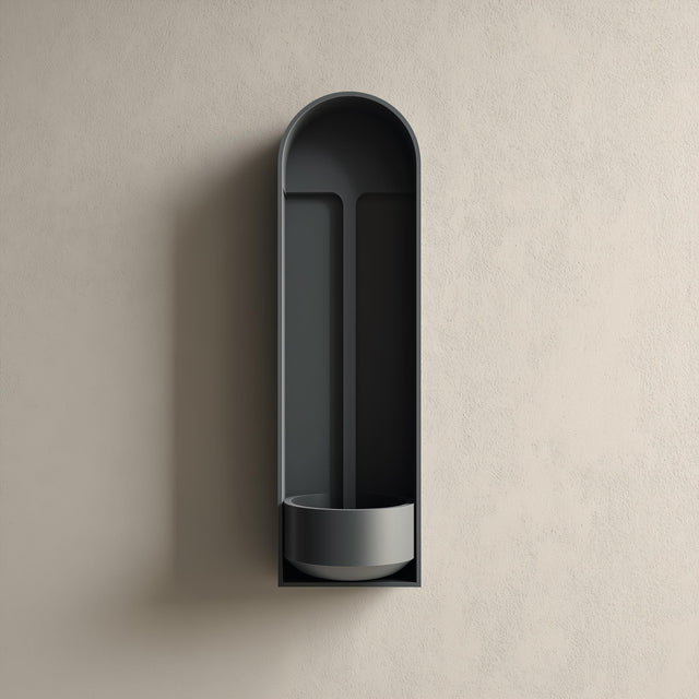 3D printed arched niche wall shelf with a tall recessed alcove and a small built-in bowl tray at the bottom, minimalist design mounted on a textured wall.