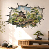 3D broken wall vinyl decal showing a watercolor Japanese garden with a pagoda, arched bridge, trees, and pond reflection inside a cracked wall opening.