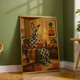 Checkered Giant Rabbit Reading in Armchair Poster | Mid Century Modern Bunny Wall Art | Yellow Brown Decor | Cozy Retro Living Room Print