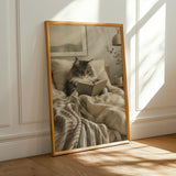 Norwegian Forest Cat Reading in Bed Poster | Modern Gouache Cat Wall Art | Warm Beige Charcoal Gray Decor | Cozy Bedroom Reading Nook Print