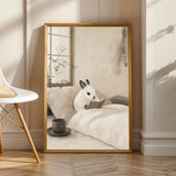 Dwarf Hotot Rabbit Reading in Bed Poster | Japanese Zen Sumi-e Bunny Wall Art | Warm Ivory Fog Gray Decor | Minimalist Bedroom Print