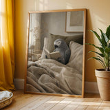 African Grey Parrot Reading in Bed Poster | Modern Soft Gouache Bird Wall Art | Warm Beige Oat Milk Decor | Cozy Minimalist Bedroom Print