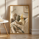 Lutino Cockatiel Reading in Bed Poster | Modern Soft Gouache Bird Wall Art | Warm Beige Oat Milk Decor | Cozy Minimalist Bedroom Print