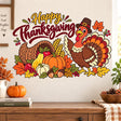 Happy Thanksgiving wall decal with gold and burgundy script, a turkey, cornucopia, pumpkins, apples, wheat and fall leaves.