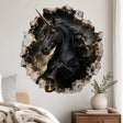 Rearing black unicorn with a gold-colored spiral horn inside a printed cracked-wall opening, with stars and amber clouds.