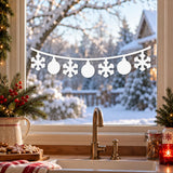 White window garland decal with three round ornaments and four snowflakes hanging from a gently curved line.