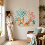 Bathroom seashell decal with an orange starfish, cream shell centerpiece and turquoise reef accents.