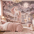 White unicorn with a pink mane beside a moonlit lake, cherry blossoms, lotus flowers and misty mountains in a bedroom wall mural.