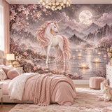 White unicorn with a pink mane beside a moonlit lake, cherry blossoms, lotus flowers and misty mountains in a bedroom wall mural.