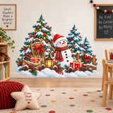 Festive snowman vinyl wall decal surrounded by a Christmas tree, rustic fence and snow-covered evergreen trees.