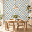 Pale blue and cream checkered wallpaper with delicate olive, taupe and blue gray botanical sprigs.