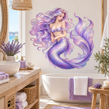 Purple mermaid wall decal with flowing violet hair, a curled tail, teal seaweed, bubbles and marine plants.