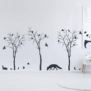 Nature-inspired wall decal set featuring trees, birds, and wildlife for charming interior decor.