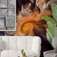 Abstract orange and gray peel and stick wall mural displayed in a modern living room.