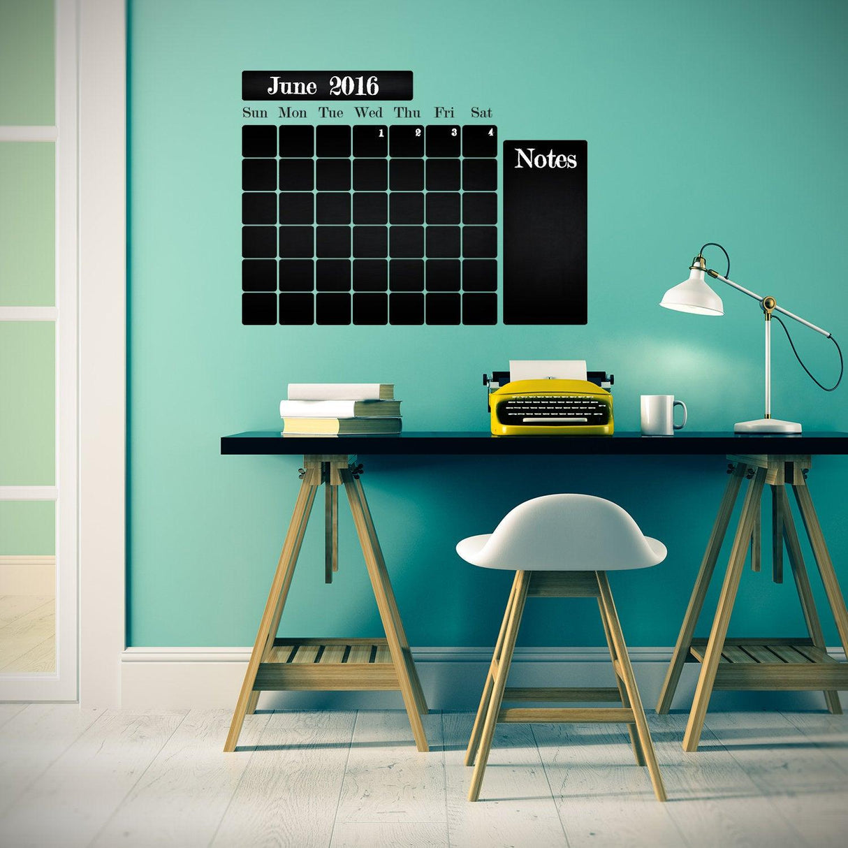 Kitchen blackboard decal fridge wall calendar sticker on a blue wall above a desk with a typewriter and chair.