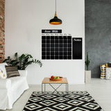 Kitchen blackboard decal wall calendar with notes section in modern living room decor.