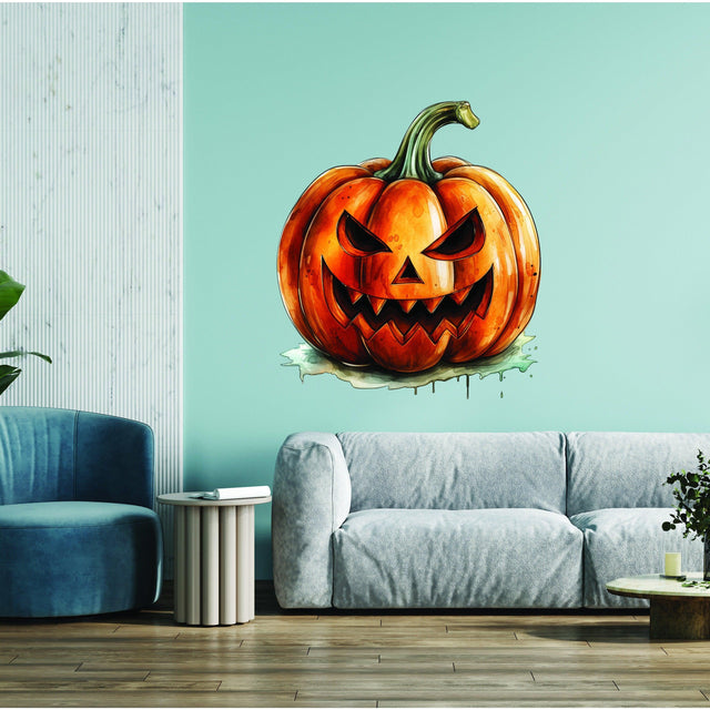 Orange smiling pumpkin-face vinyl wall decal displayed on a teal wall.